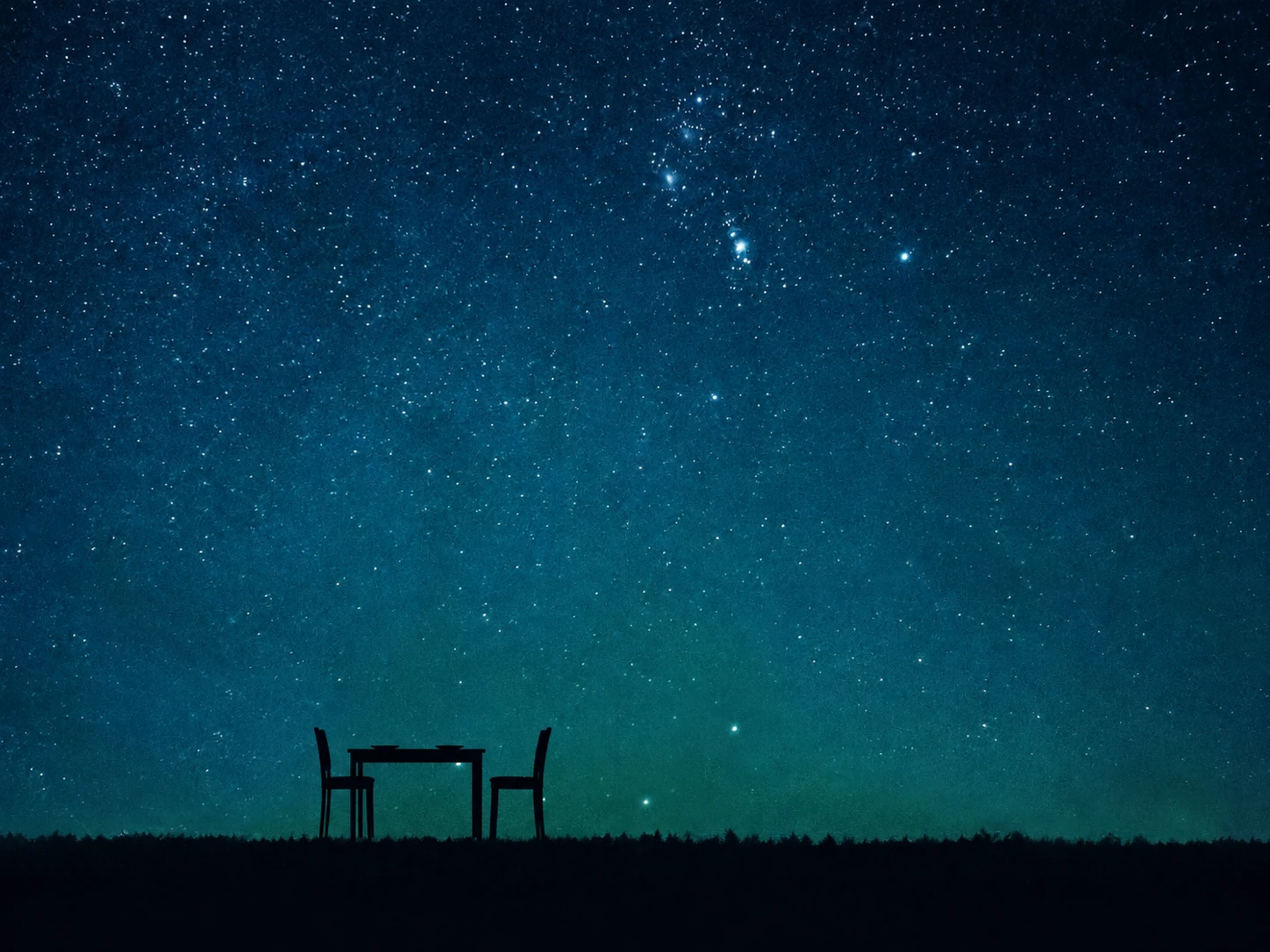 A dinner table with two chairs, one pushed back a little, shown as black silhouettes against a starry sky